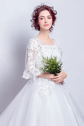 Robe de mariée princesse avec manches courtes en guipure
